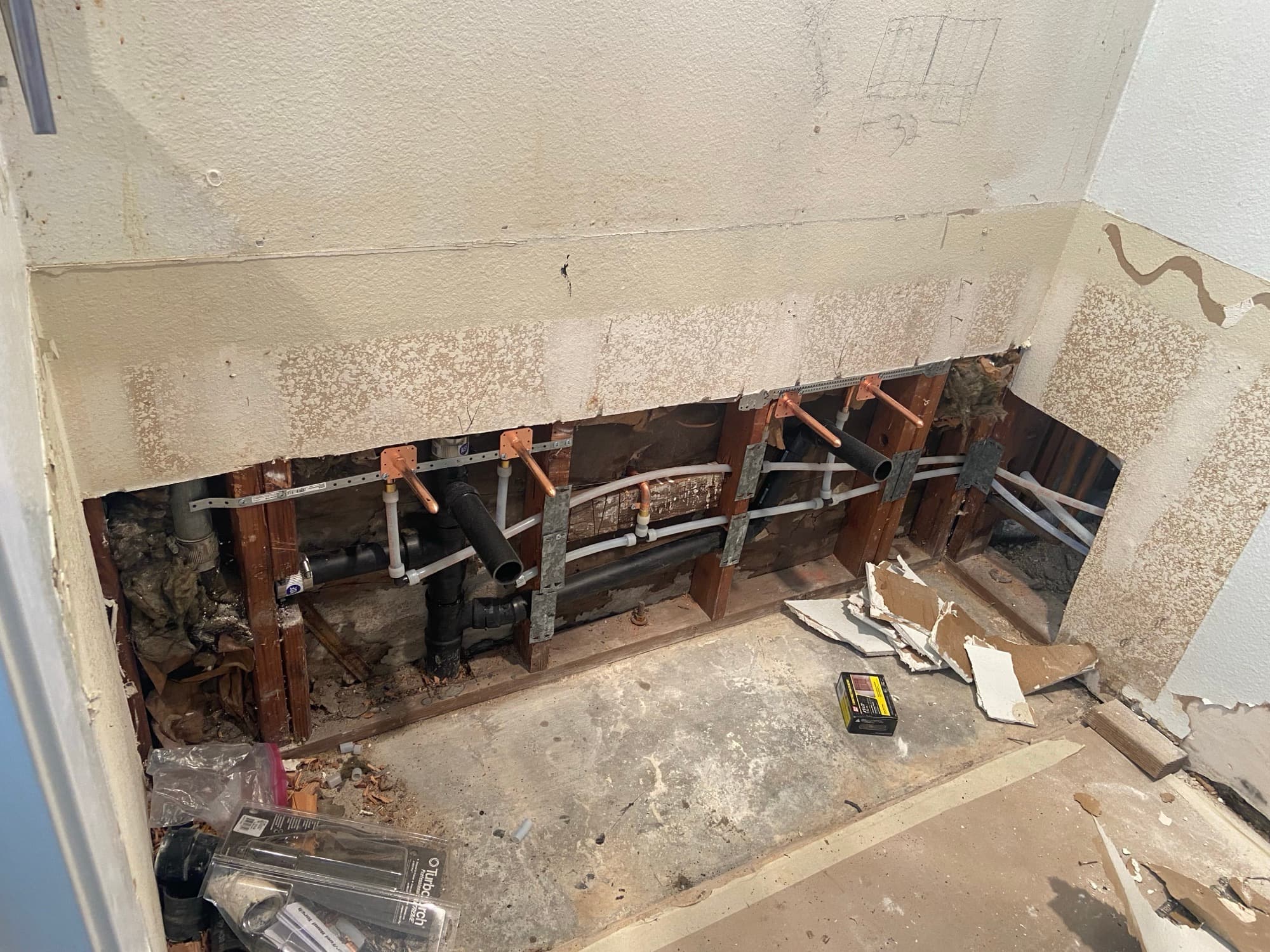New copper stub-outs installed in an open wall cavity for a home repipe, Orange County